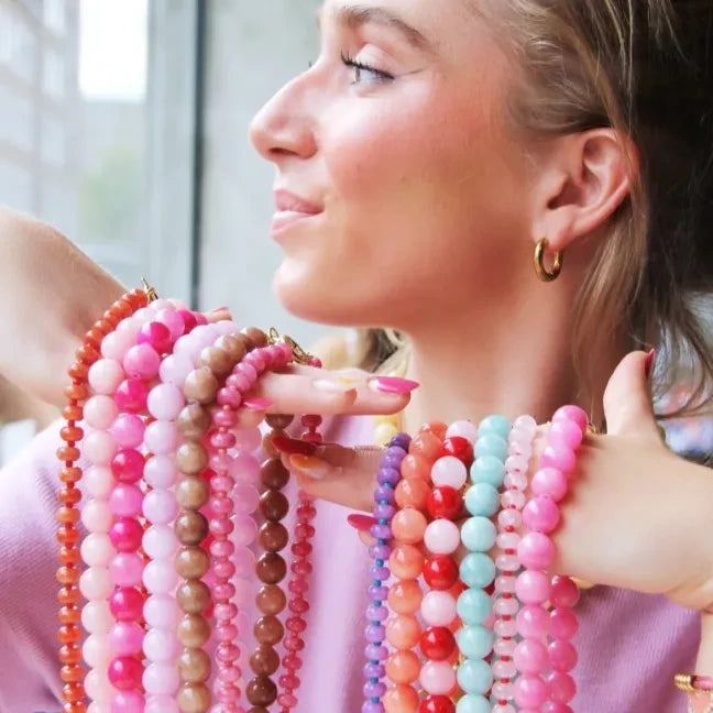 Kralen ketting van natuursteendonuts - oranje/rood