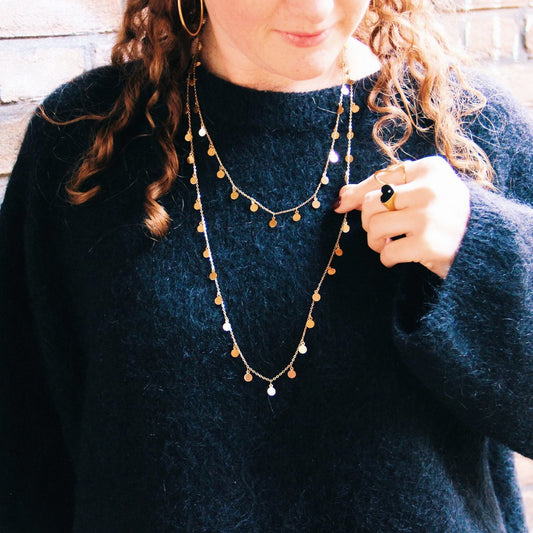 Lange ketting met dubbele munt