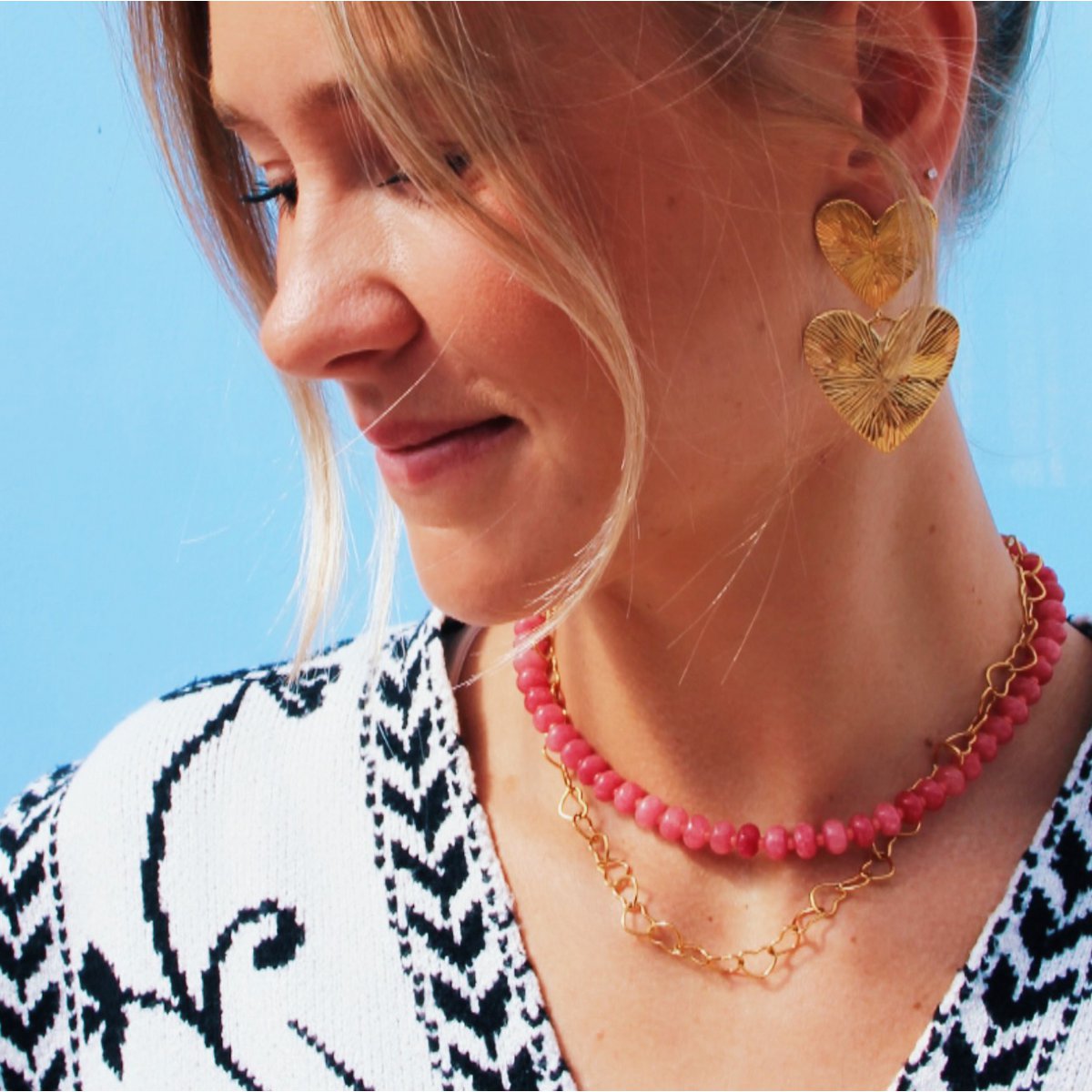 Kralen ketting van natuursteendonuts - oranje/rood