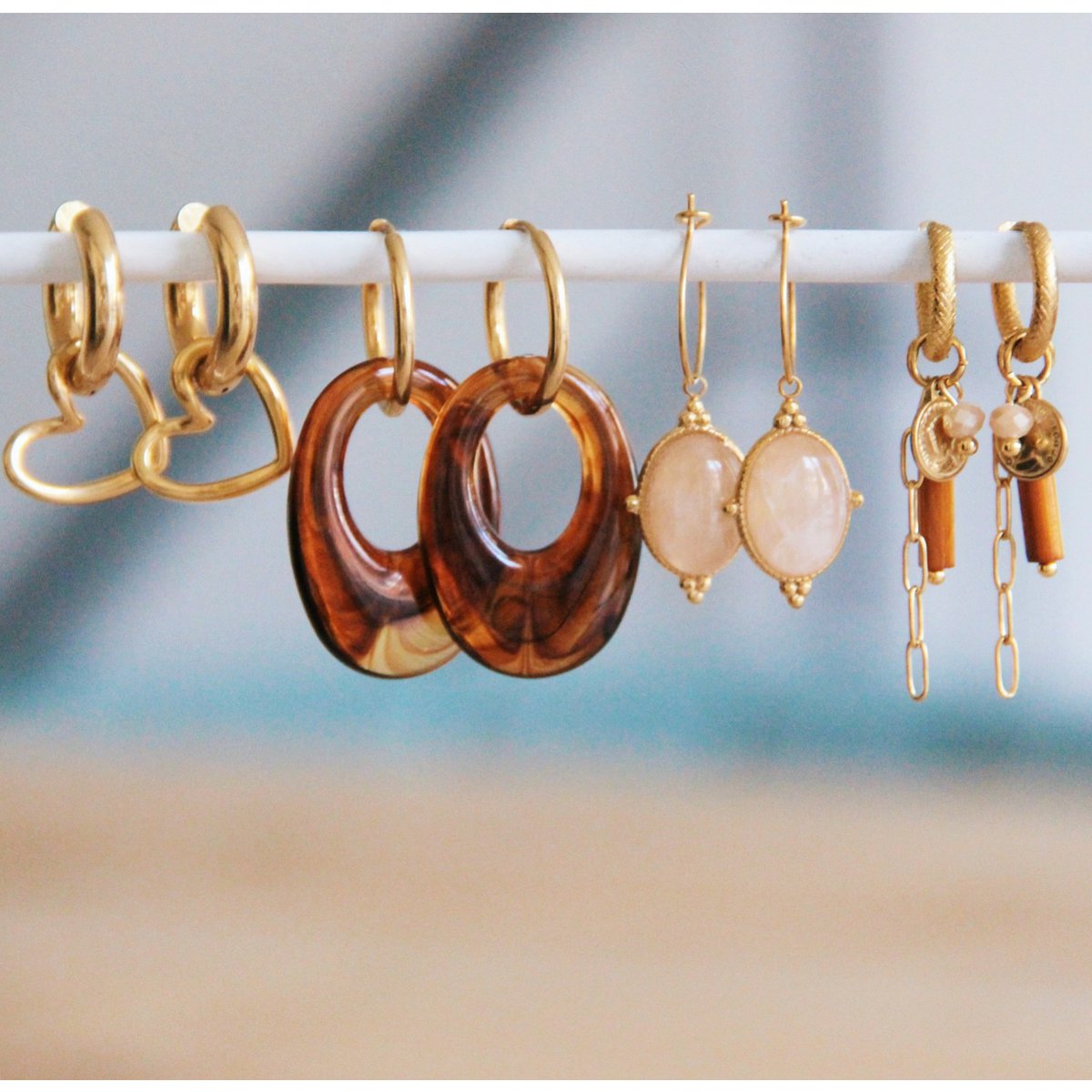 RVS brede creool met open hart - goud